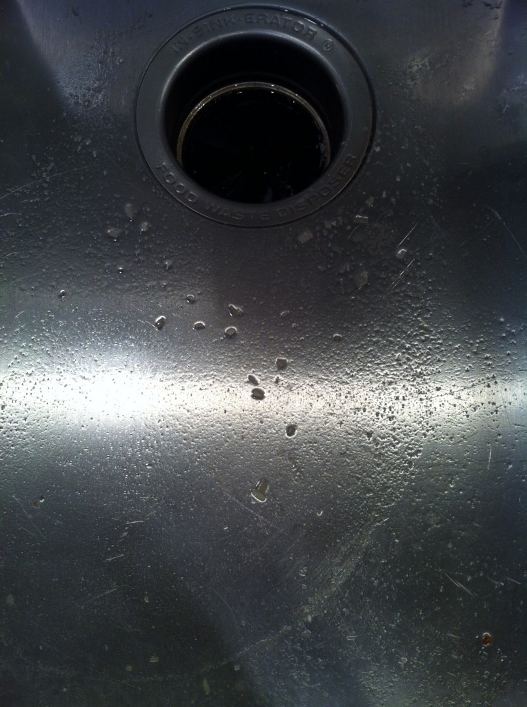 Small Particles from the First Draining of the Tank