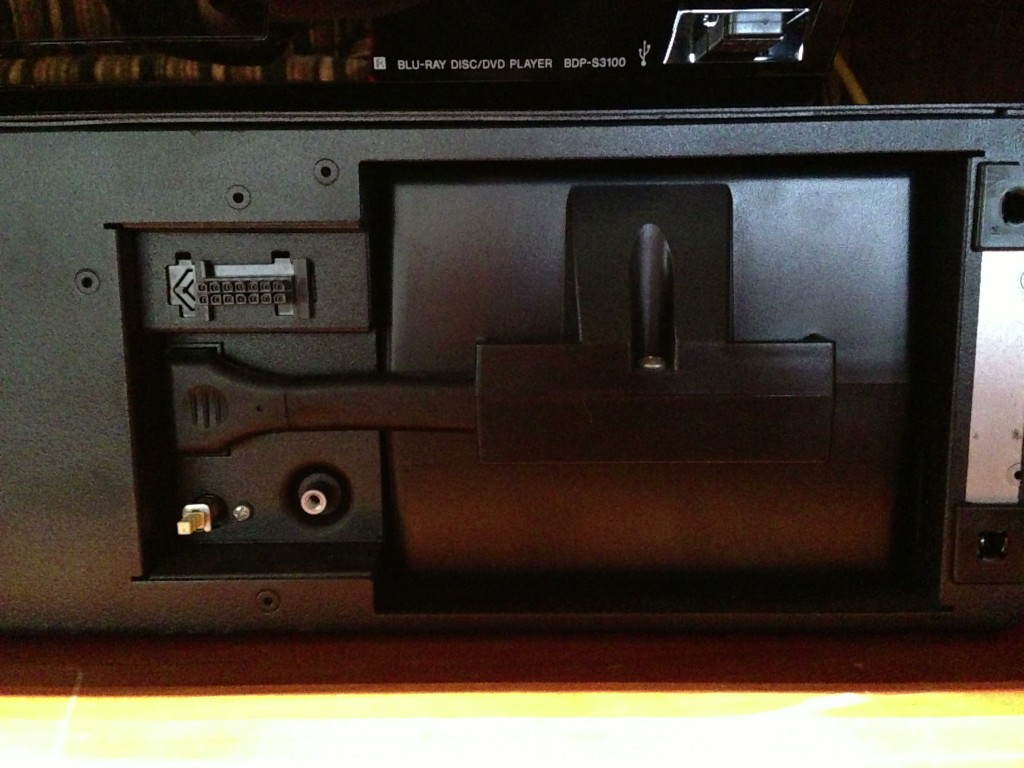 Put the cover on the battery pack, re-attach screws, insert into UPS, reconnect, then re-install metal retaining bar.