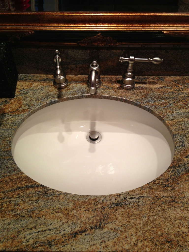 Open a hot water faucet any time you drain a water heater