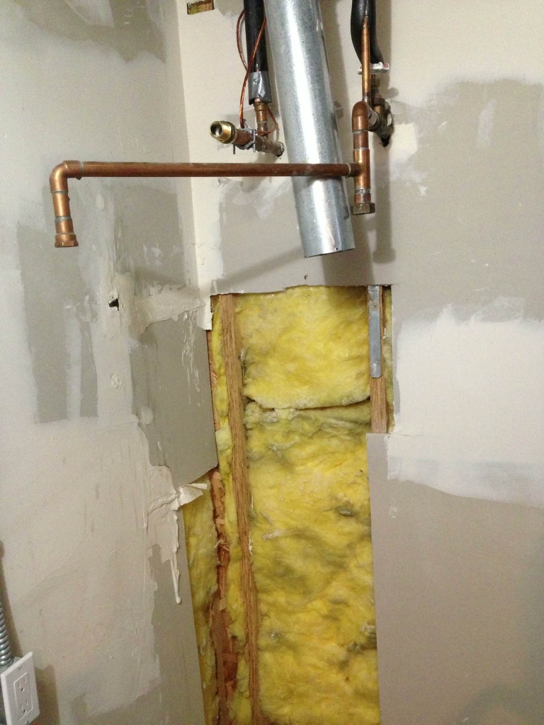 Old 75 gallon water heater removed
