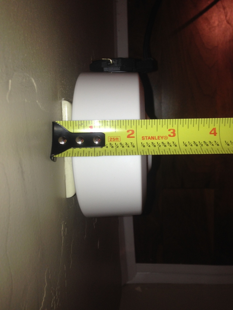 Fridge surge protector sticks out about 2 inches